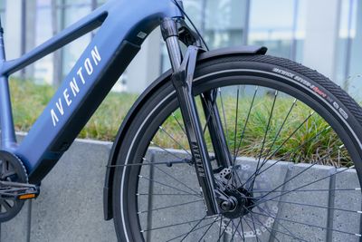 a close up of a bike parked near a wall