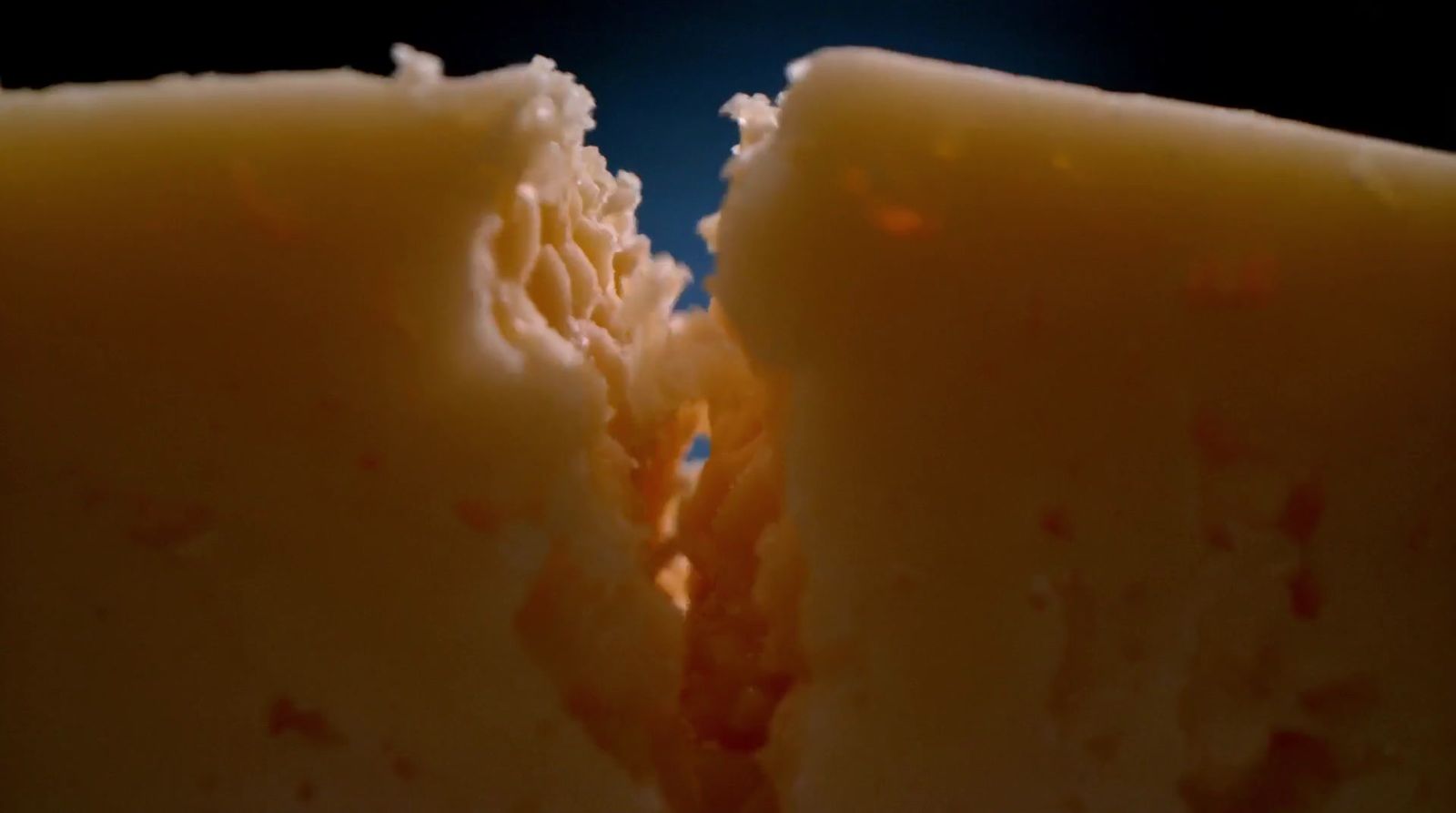 a close up of a piece of cheese