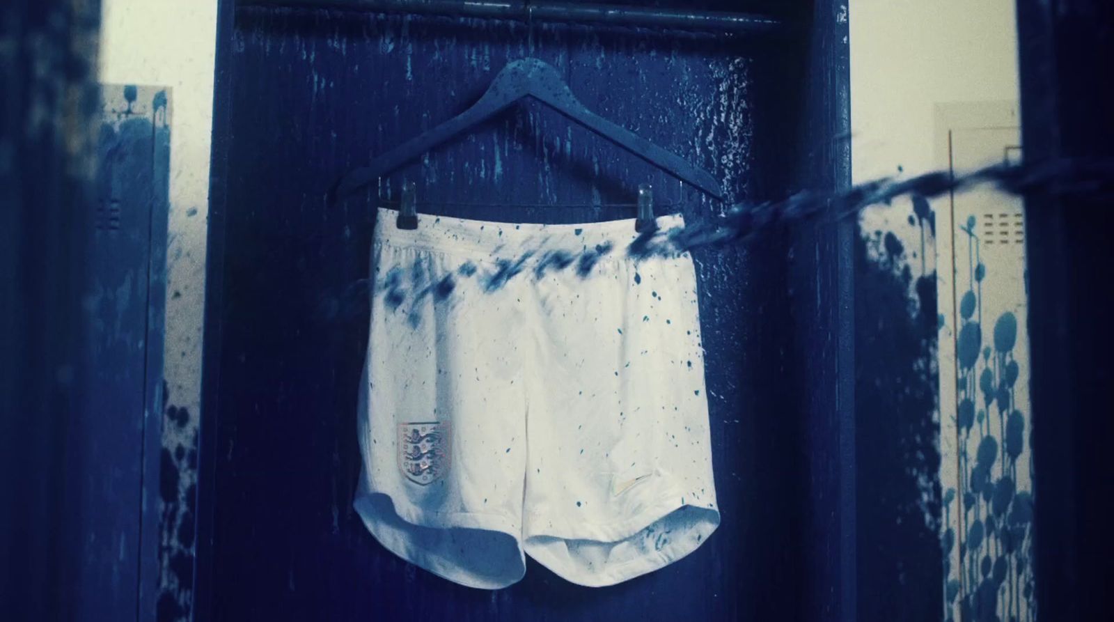 a pair of shorts hanging on a clothes line