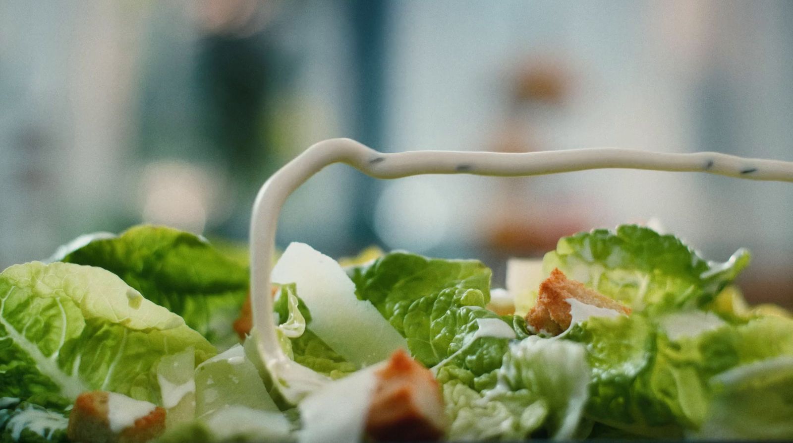 a close up of a salad with lettuce