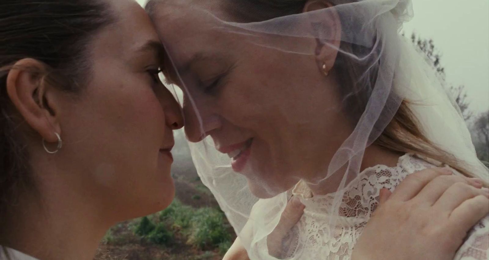 a couple of women standing next to each other