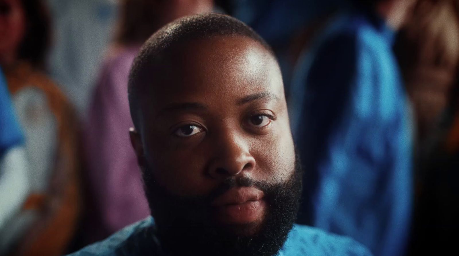 a close up of a person with a beard