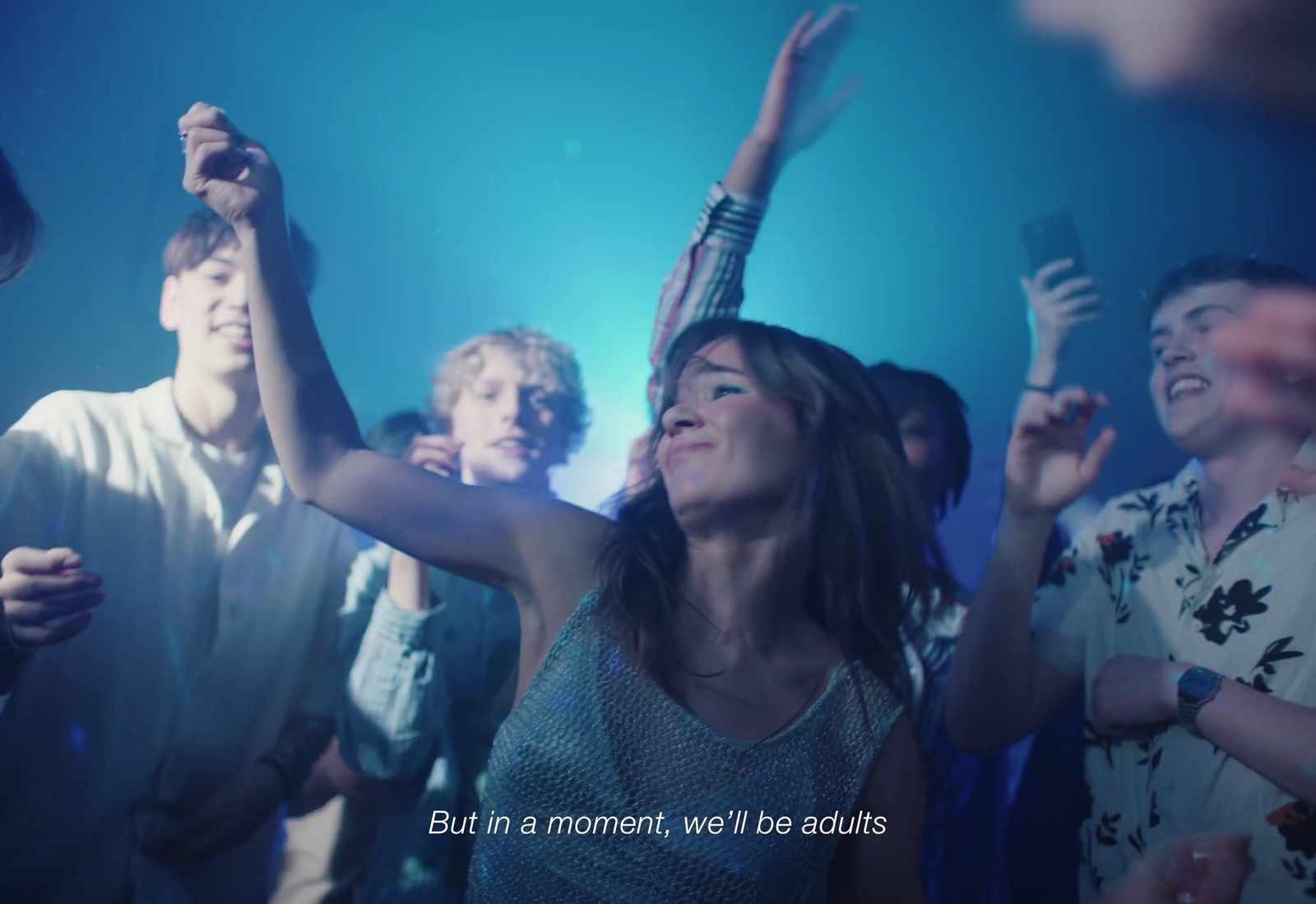a group of people standing next to each other