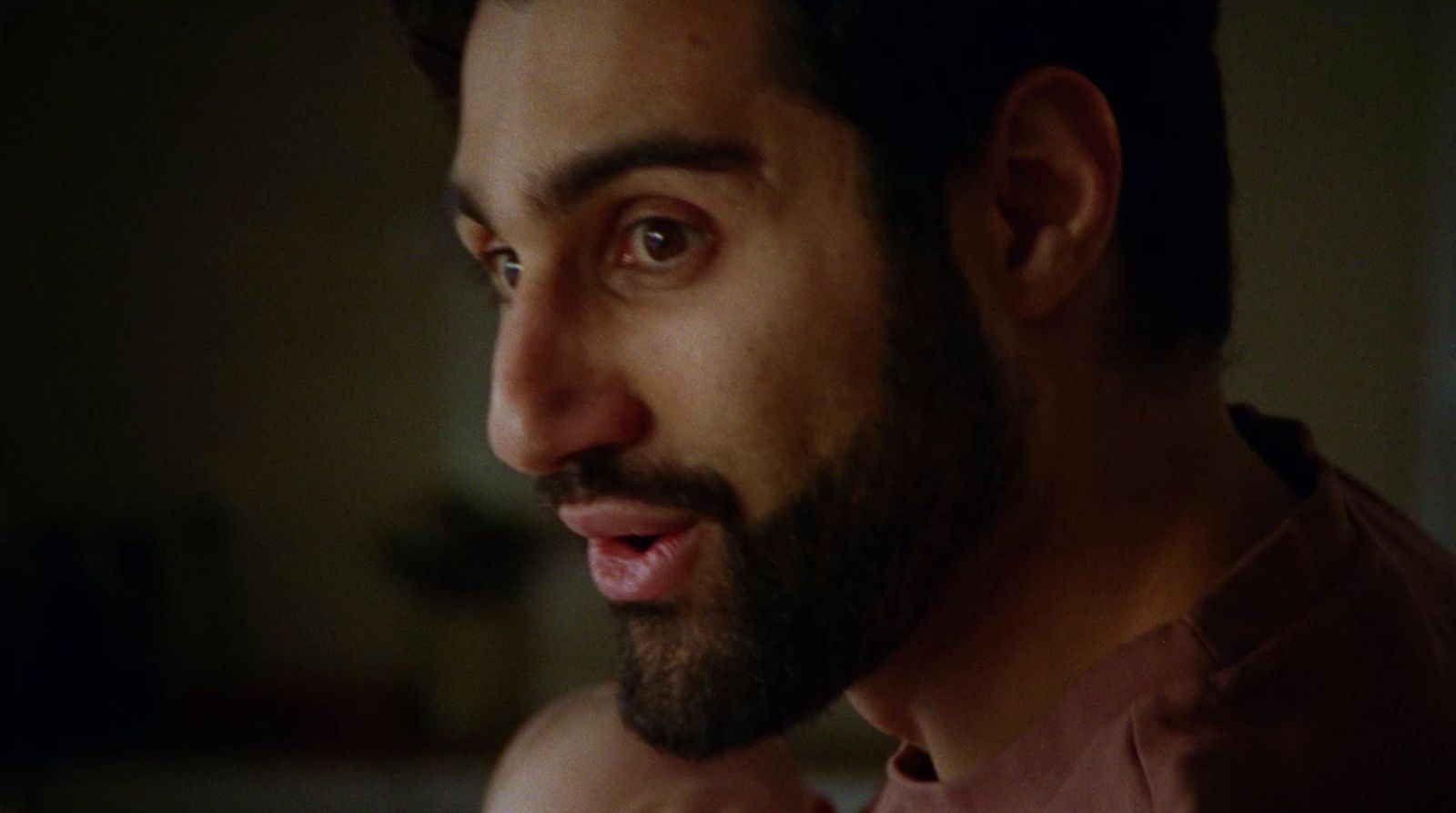 a close up of a person with a beard