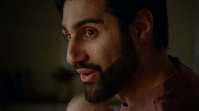 a close up of a person with a beard