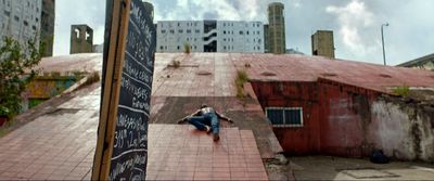 a man riding a skateboard down the side of a ramp