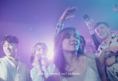 a group of people standing next to each other