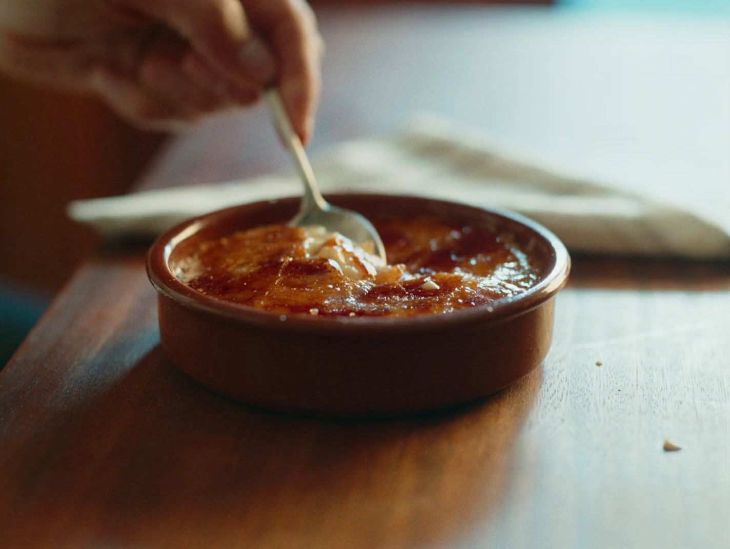 a bowl of food with a spoon in it