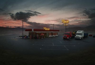 a couple of trucks parked in a parking lot