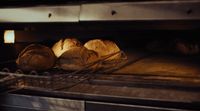 a close up of bread baking in an oven