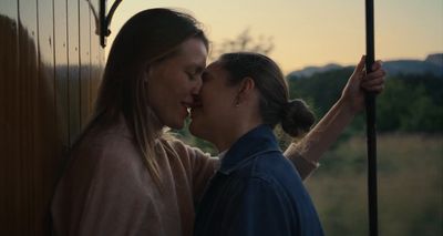 a couple of women standing next to each other