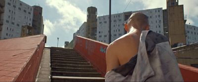 a man walking down a flight of stairs