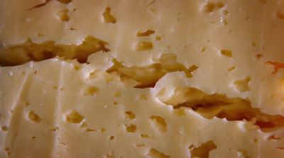 a close up of a piece of cheese