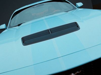 a close up of the hood of a blue sports car