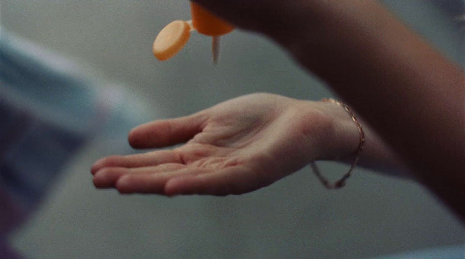 a person holding a piece of food in their hand