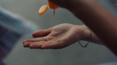 a person holding a piece of food in their hand