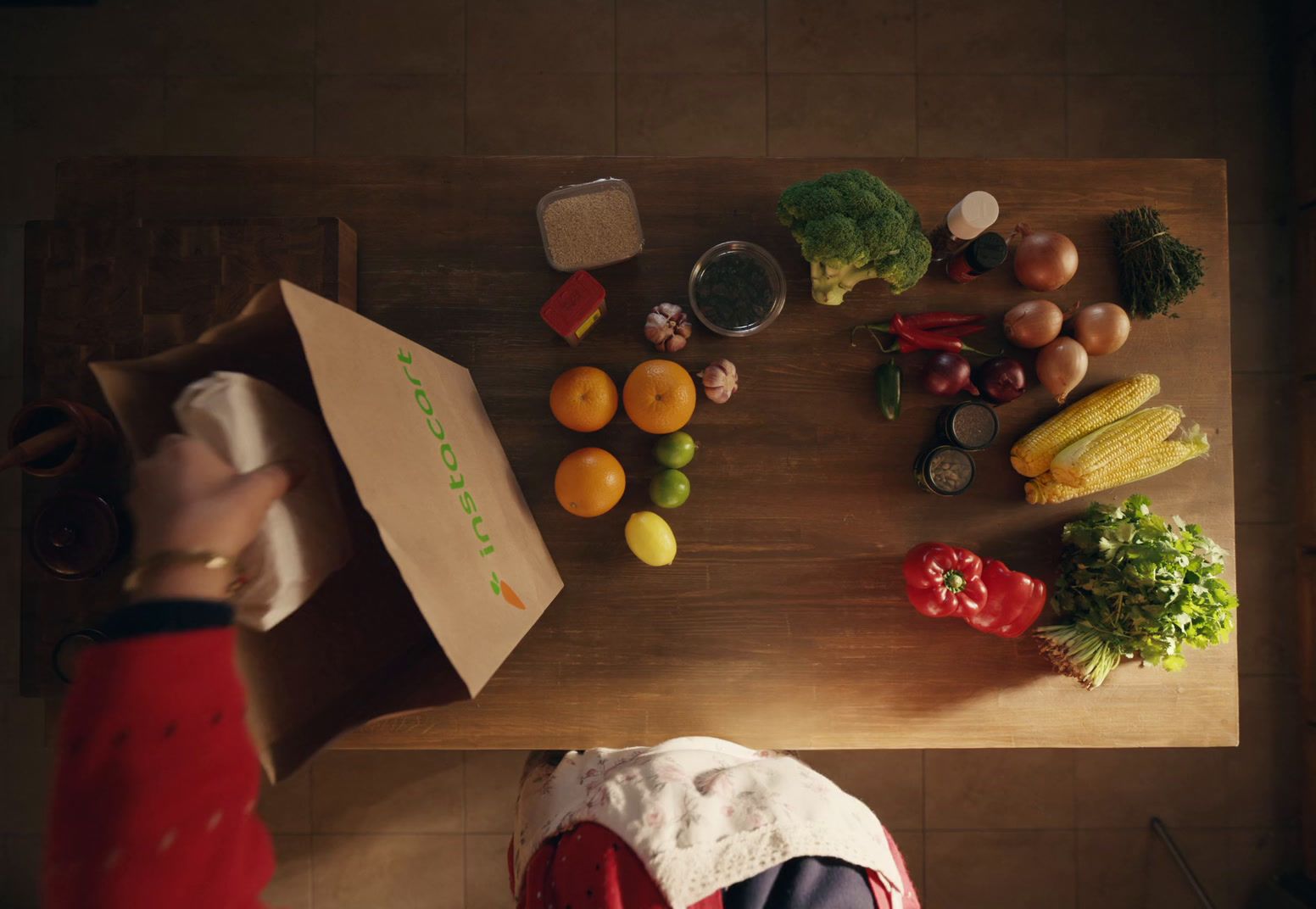 a wooden table topped with lots of vegetables