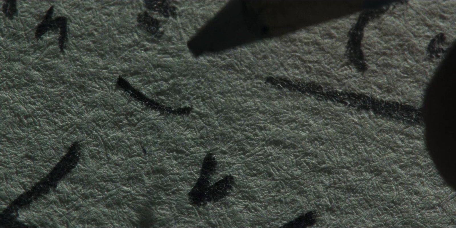 a close up of a clock face on a wall