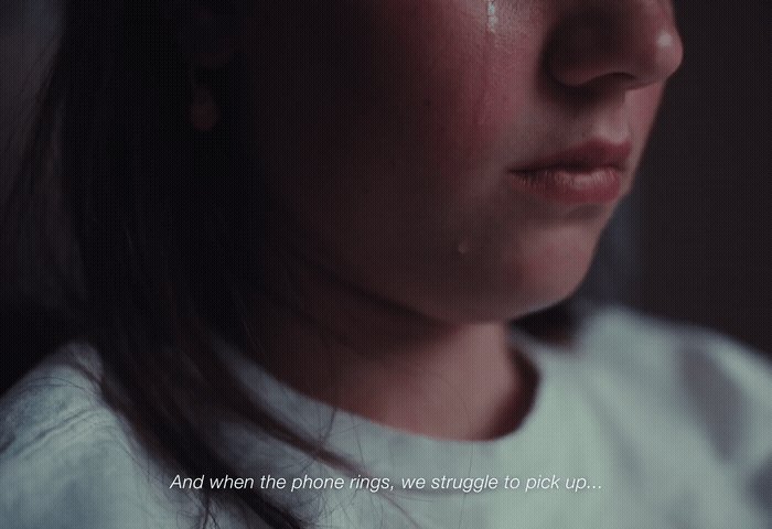 a close up of a person with a sad look on their face