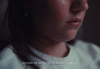 a close up of a person with a sad look on their face