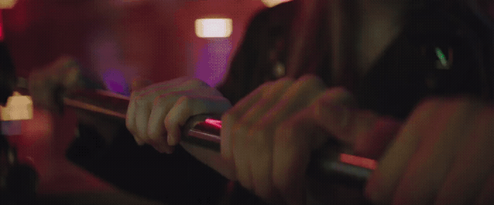 a blurry photo of a person holding a microphone