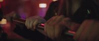 a blurry photo of a person holding a microphone