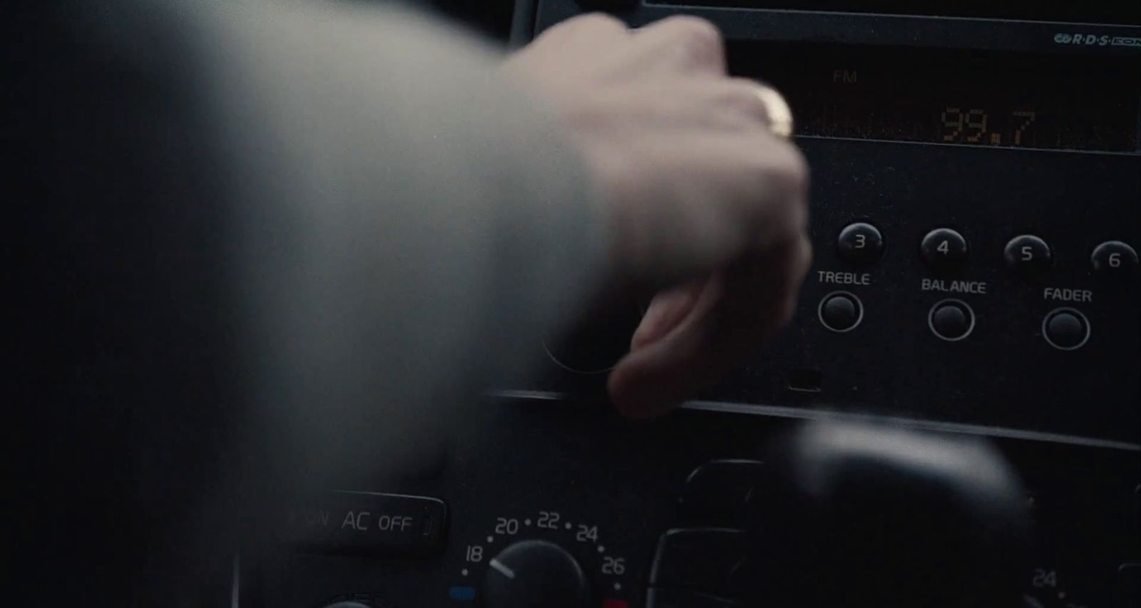 a person is pressing buttons on a radio