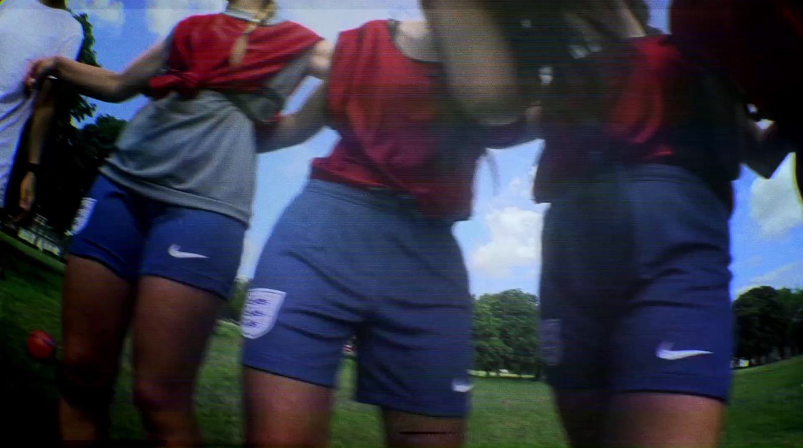 a group of women standing next to each other