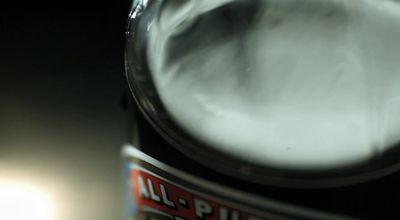 a close up of a can of beer