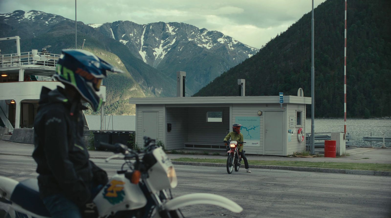 a person riding a motorcycle on a road