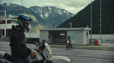 a person riding a motorcycle on a road