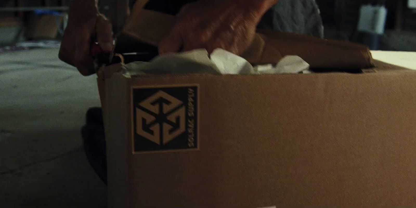 a person is unpacking a box of food