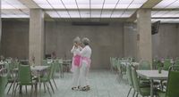 a couple of people that are standing in a room