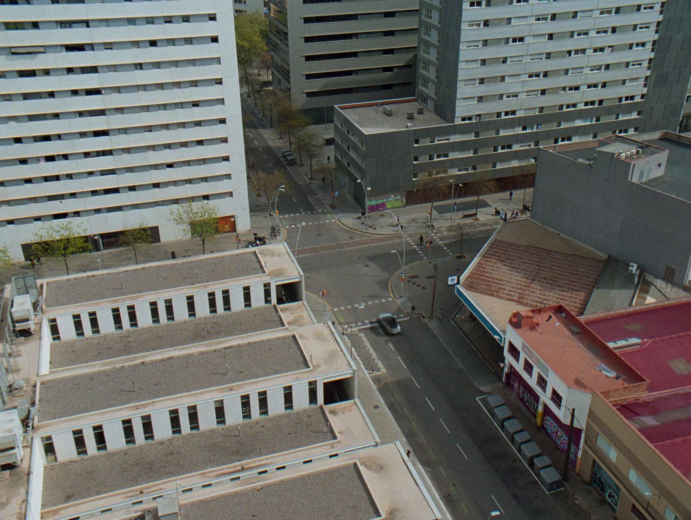 an aerial view of a city with tall buildings