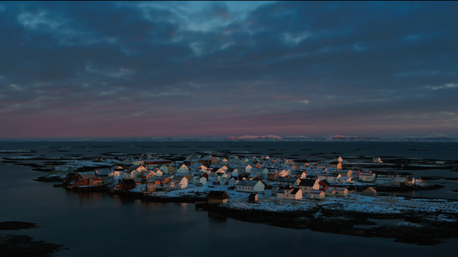 a small village on an island in the middle of the ocean