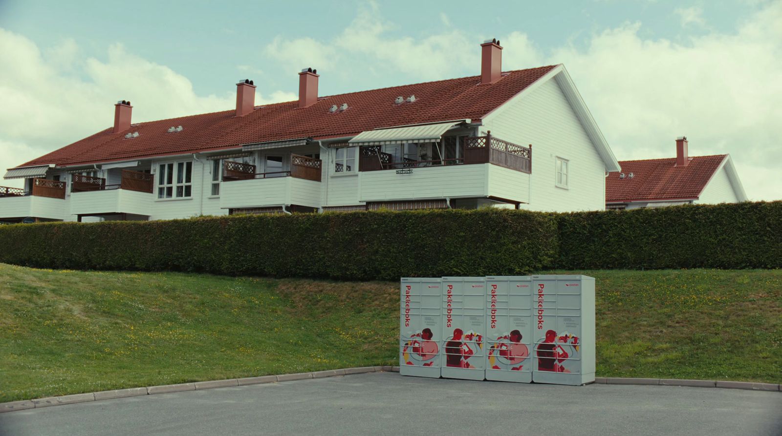 a large white house with a red roof