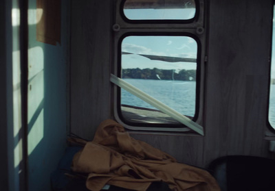 a view of a body of water from inside a boat