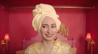 a woman with a towel on her head