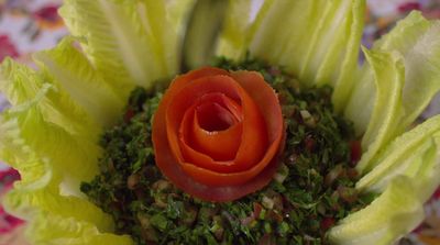 a close up of a flower made of lettuce