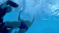 a couple of people that are in the water