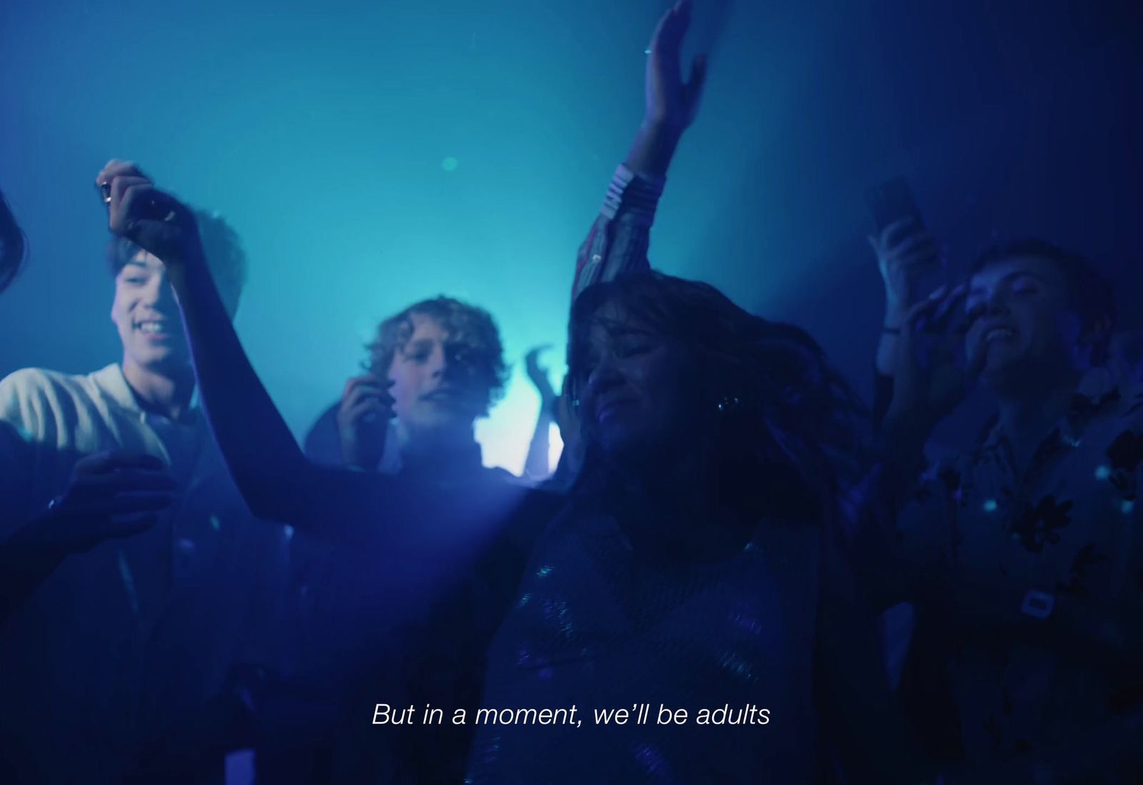 a group of people standing next to each other