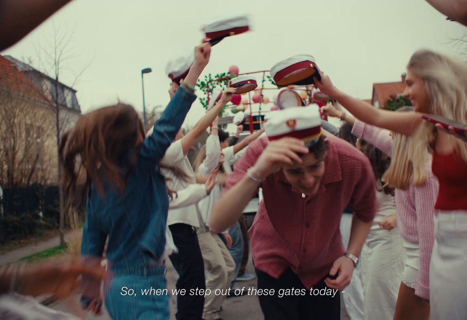 a group of people standing around each other