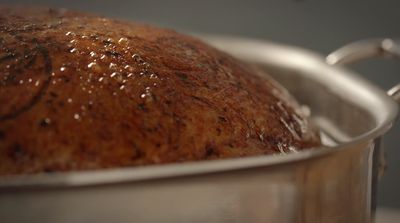 a close up of a pot with food inside of it