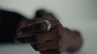 a person with a ring on their finger