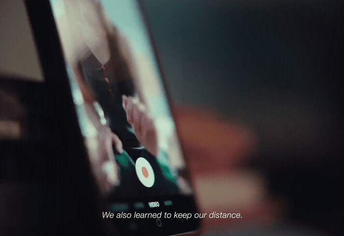 a cell phone with the text we also learned to keep our distance