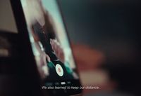 a cell phone with the text we also learned to keep our distance