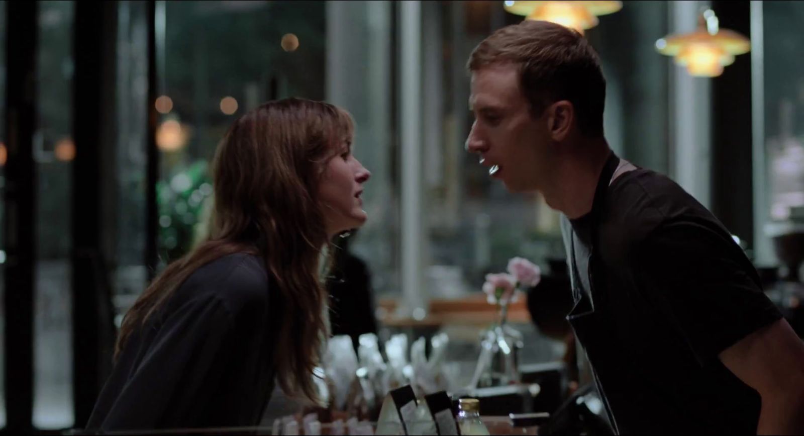 a man and a woman sitting at a table