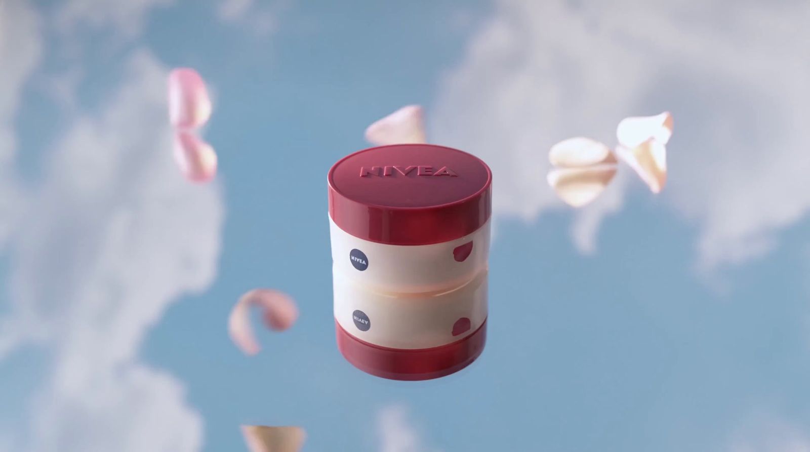 a red and white pill bottle floating in the air