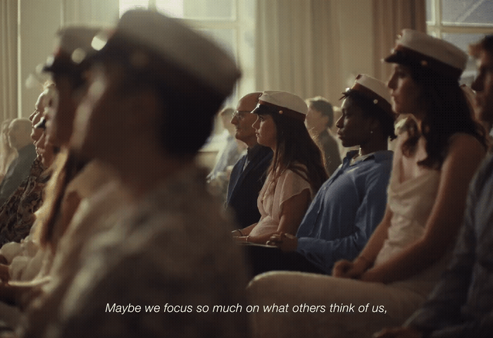 a group of women sitting next to each other