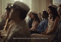 a group of women sitting next to each other